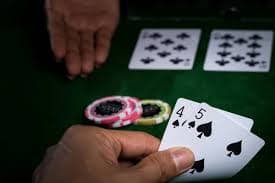 Filipino player checking ah33 app withdrawal status on mobile phone in the Philippines